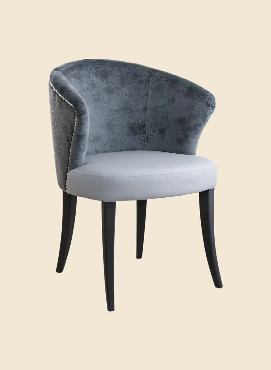 Fauteuil Bosa à passepoil